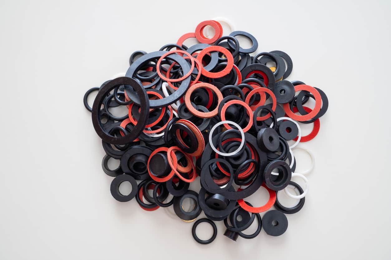 A pile of custom gaskets designed for manufacturability.